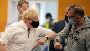 British Prime Minister Boris Johnson greets members of the public as he visits a COVID-19 vaccination centre at Little Venice Sports Centre, in London, Friday, Oct. 22, 2021. (AP Photo/Matt Dunham, Pool)  PIC:AP